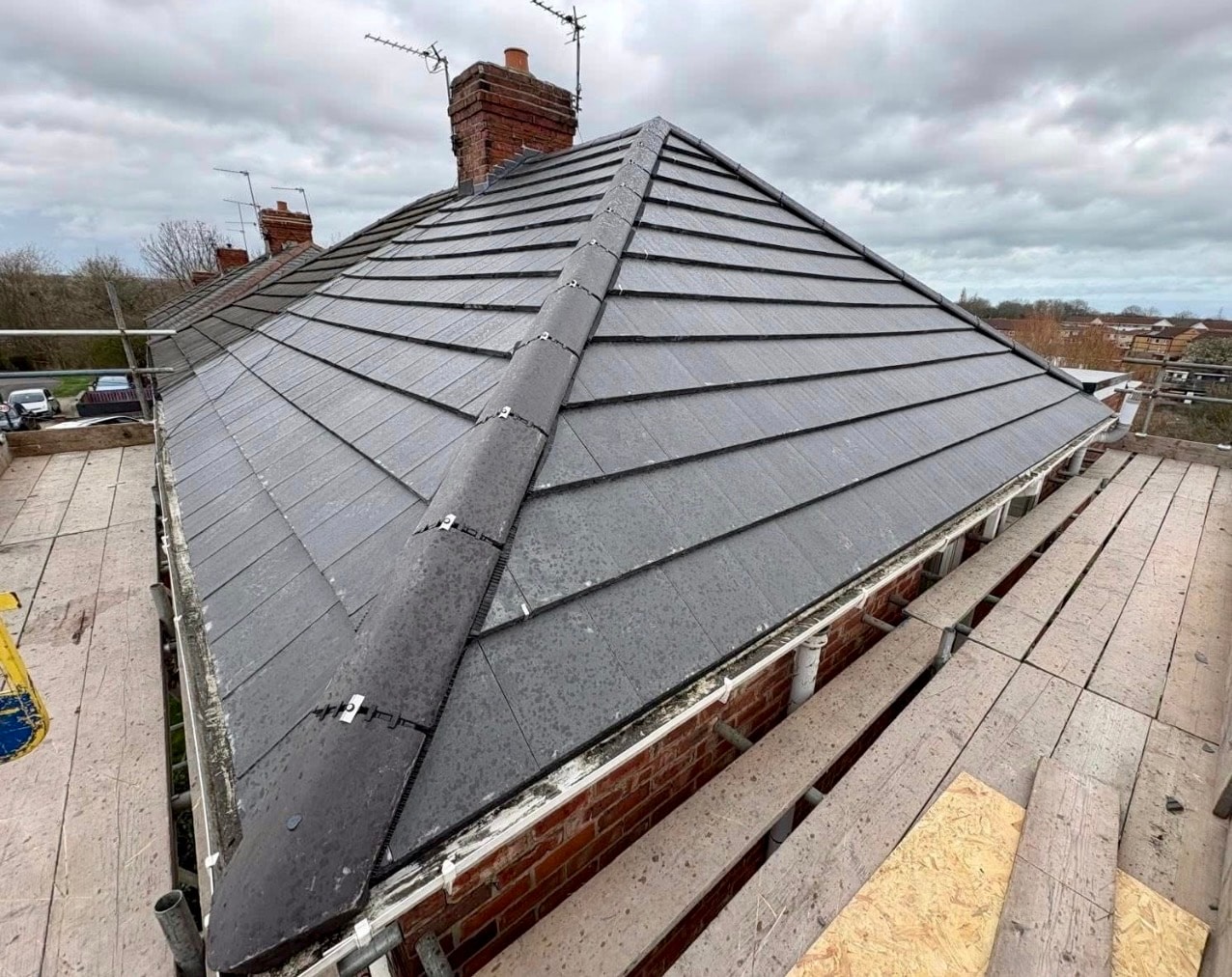 Aerial view of a complete roof replacement